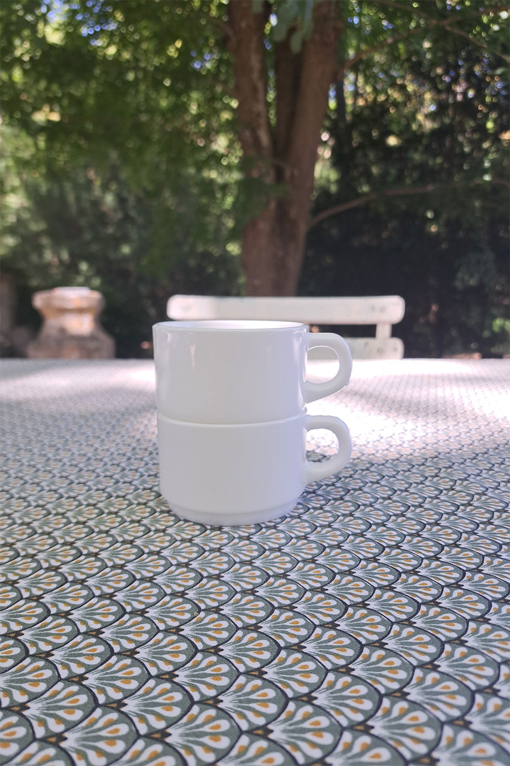 Two cups one on top of the other