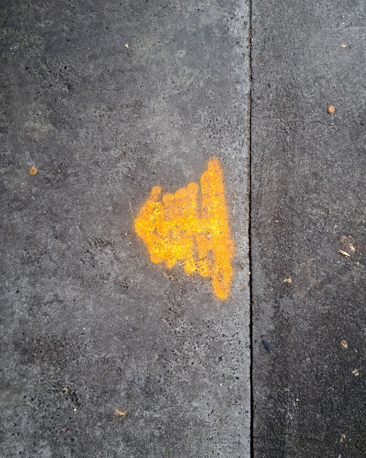 Orange markings on the ground